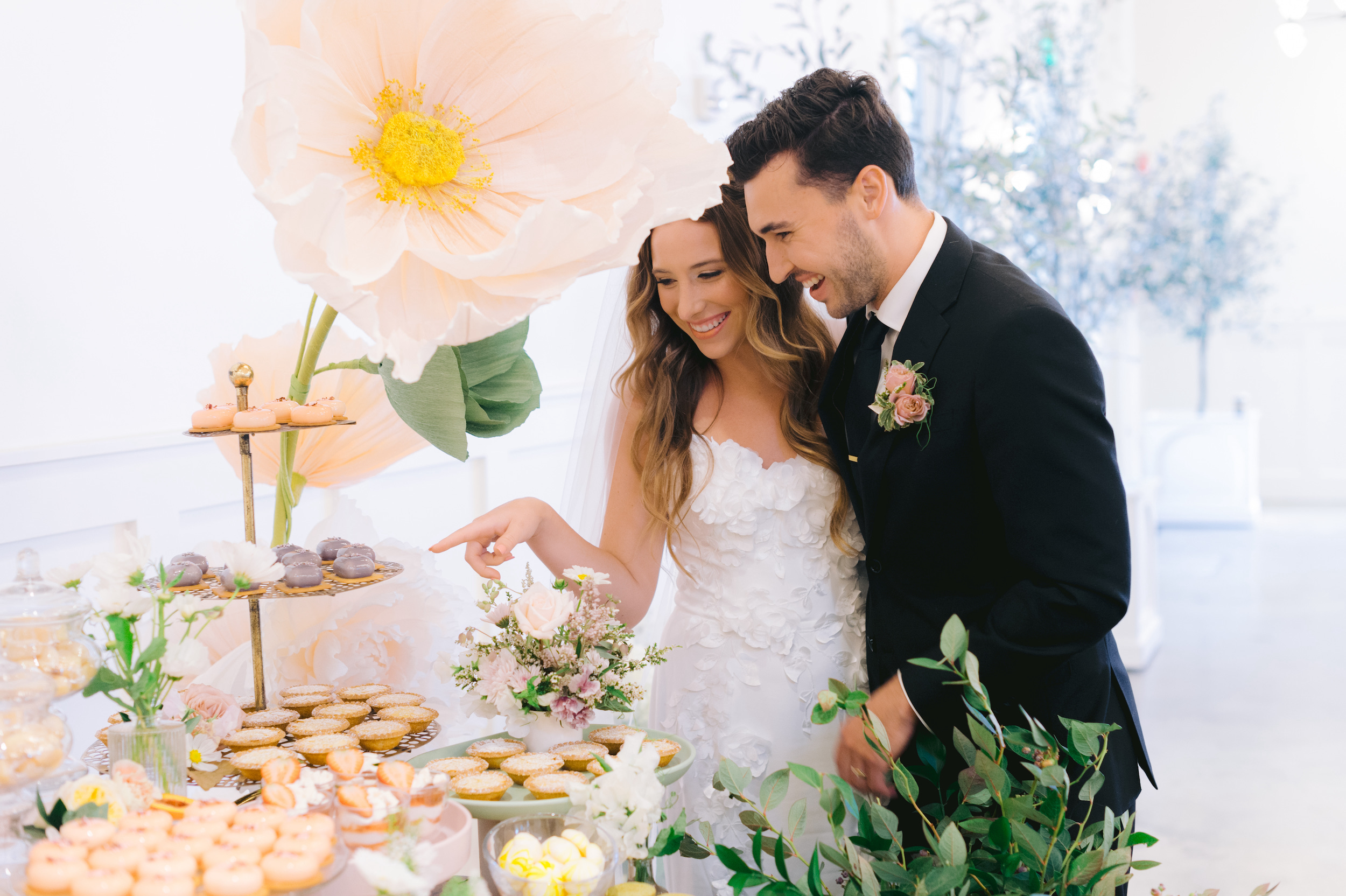 Family-style wedding reception spread by 24 Carrots Catering and Events in Southern California